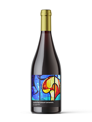 An LMU Wine Collective bottle, a 2024 Sauvignon Blanc, whose label features a 2001 stained-glass artwork by Genevieve Underwood, R.S.H.M., which graces the Interdenominational Chapel for Prayer and Peace in LMU's University Hall.